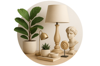 "Circular icon-style image showcasing home décor items: realplants,lamps, showpieces and small decorative accents. Minimal modern background, bright and cozy colors, premium realistic style."